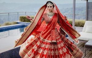 Decoding Mouni Roy’s Bridal Look In A Regal Red Sabyasachi Lehenga