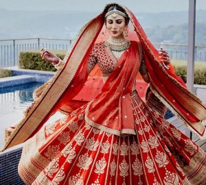 Decoding Mouni Roy’s Bridal Look In A Regal Red Sabyasachi Lehenga