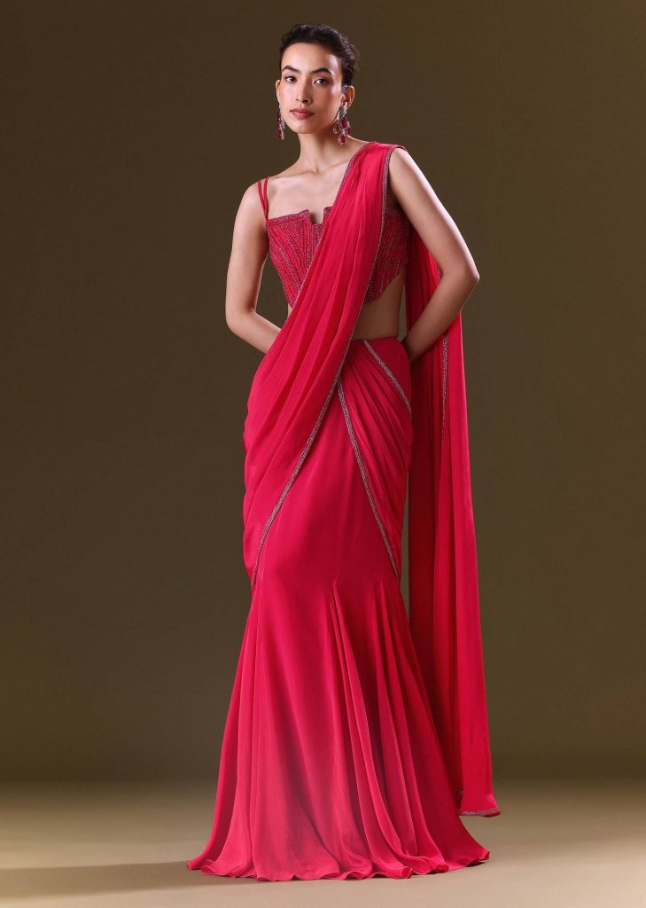 Reddish Pink Pre Stitched Draped Saree With Corset Fit Embroidered Blouse

