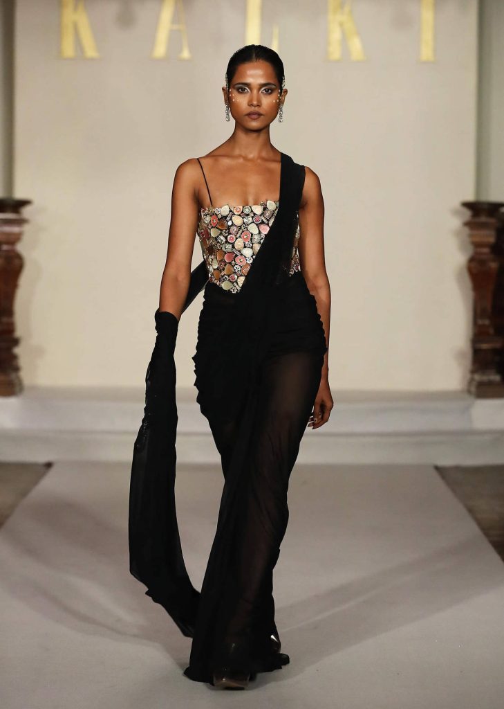 Black Lycra Corset And Detachable Drape Saree With Kundan Embroidery

