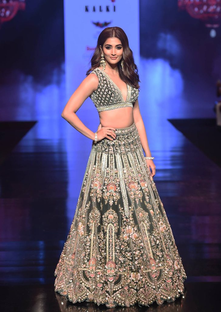 Palace Green Lehenga Choli In Velvet With Multi Colored Hand Embroidered Heritage Kalis With Hints Of Flowers

