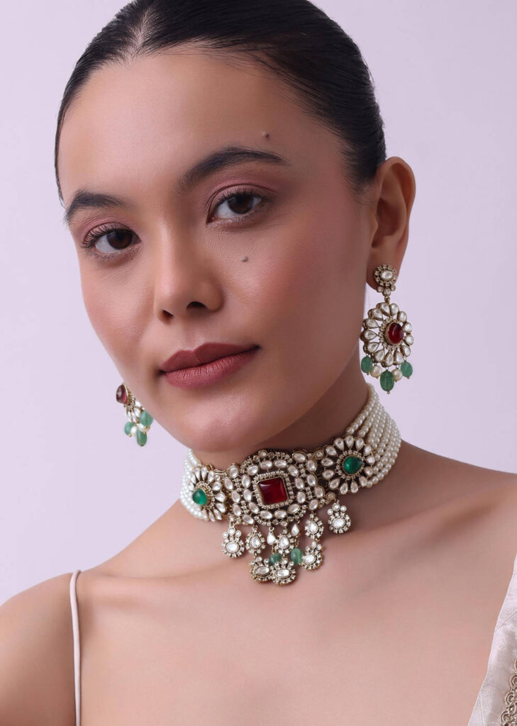 Gold Finish Kundan Choker Set With Synthetic Ruby And Emerald Stones

