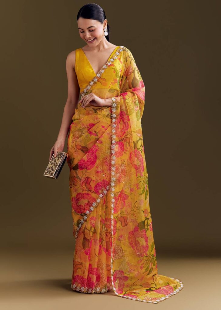 Yellow Organza Saree With Floral Print And Beaded Border
