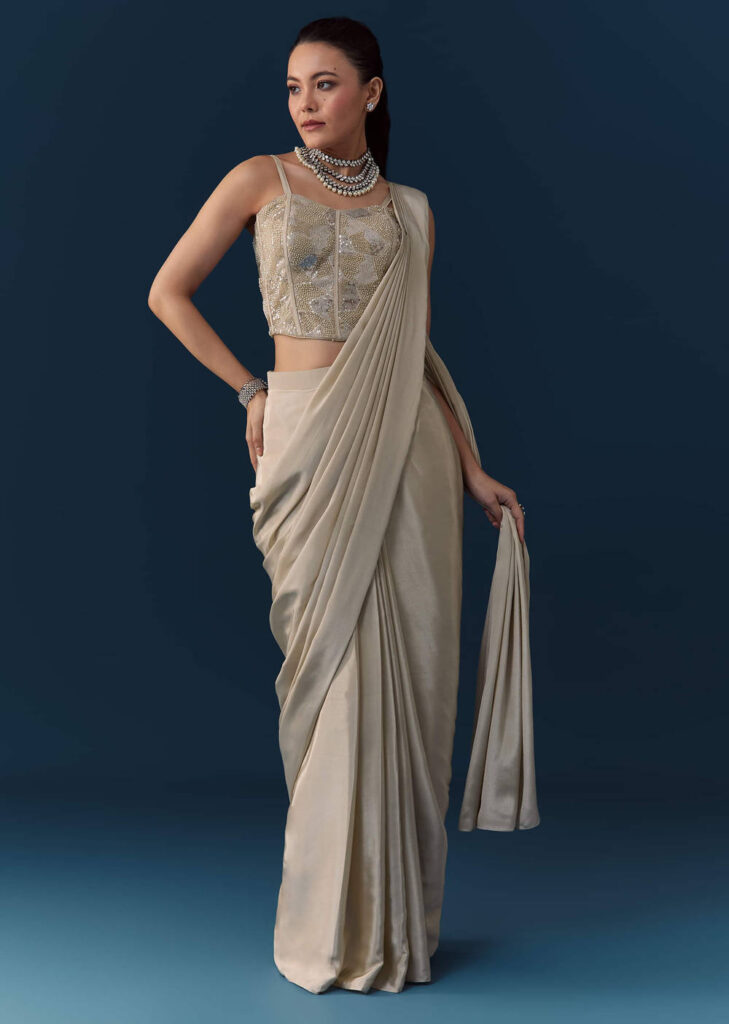 Beige Pre Pleated Saree with Sequin Corset Blouse
