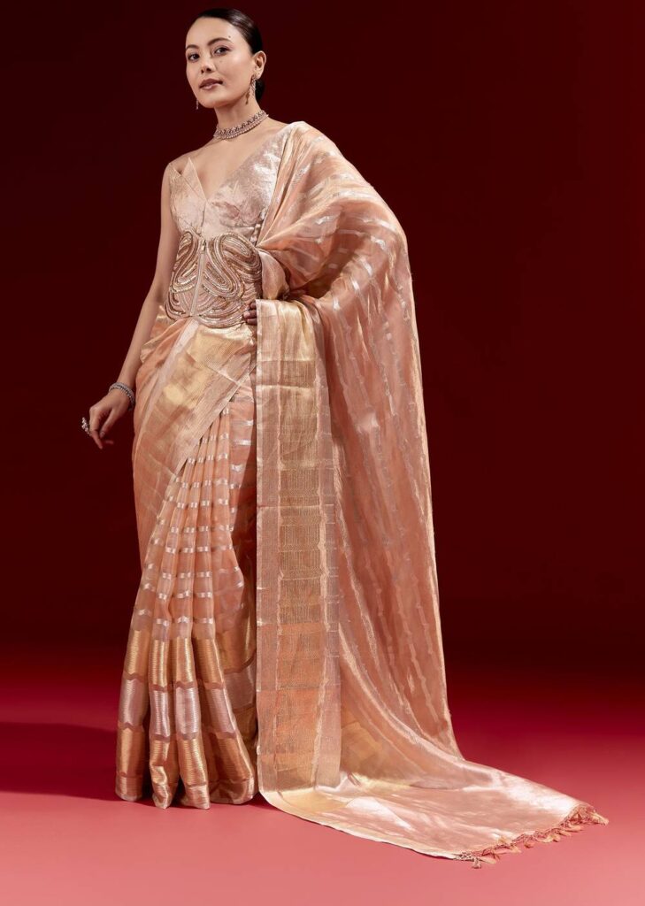 Peach Banarasi Tissue Saree With Chanderi Stripes And Embroidered Cutdana Belt

