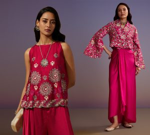 Fashionable woman wearing a modern red draped skirt and crop top set for Karwa Chauth